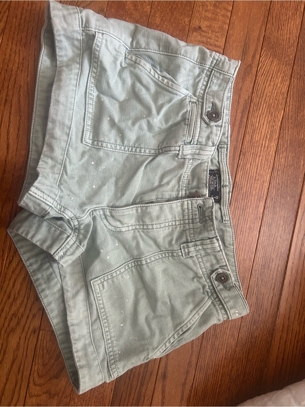 Abercrombie light Sage Green Women's Denim Shorts with paint splatter detail